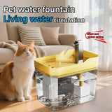 Pet water fountain with a cat sitting next to it in a living room setting.