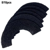 Set of eight black hair ties on a white background